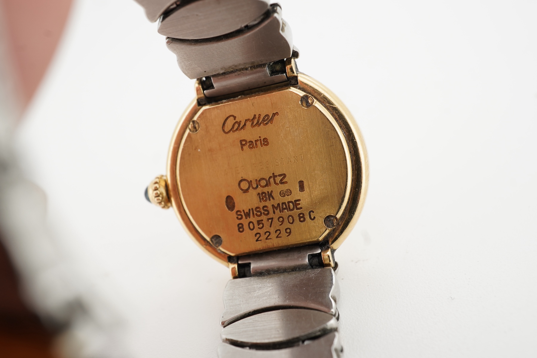 Cartier, a lady's gold and stainless steel wristwatch, 'Colisée', ref.8057908C